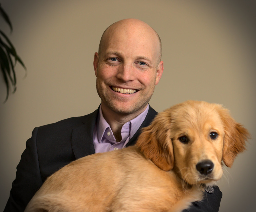 Nick Touran with
                        dog