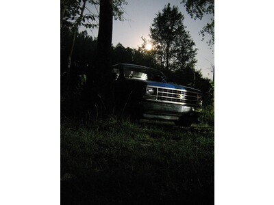 Camp truck at Steak Ride in moonlight